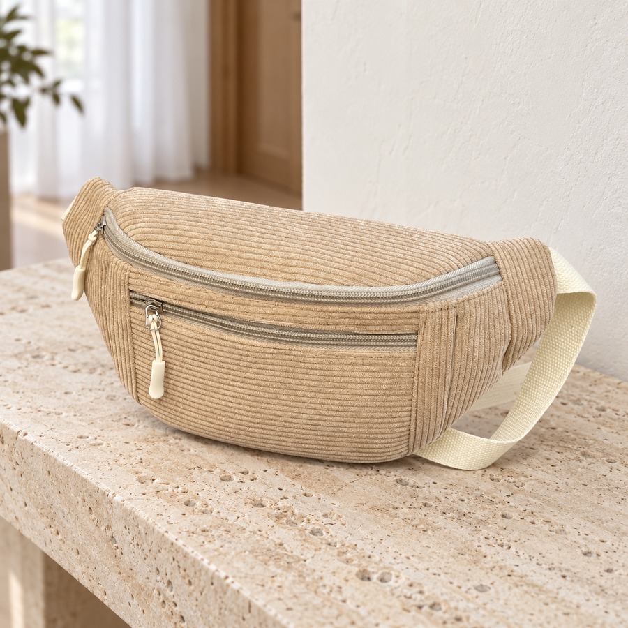 Mini Banane Velours Côtelé beige sur une console en travertin – Brin de Charme